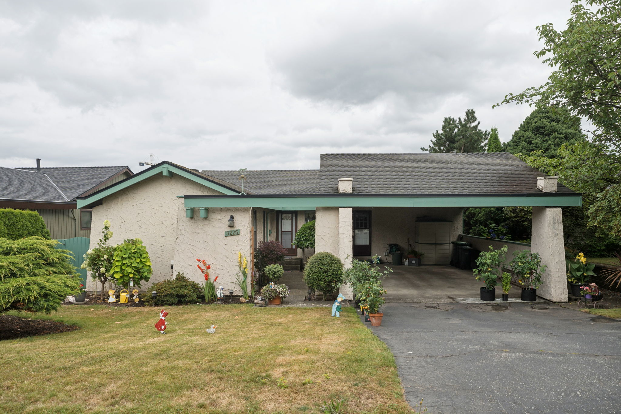 Front exterior of the rancher at 3225 Pinda Drive, Port Moody