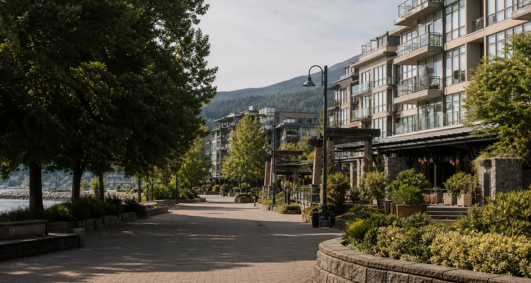 Port Moody residential homes framed by mature trees on a hillside.